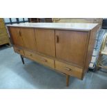 A G-Plan Fresco teak concertina door sideboard