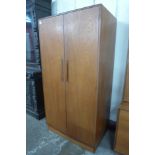 A G-Plan Fresco fitted teak wardrobe