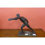 A bronze figure of a Greek male nude,