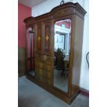 An Edward VII mahogany and marquetry inlaid combination wardrobe