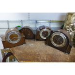 Four Art Deco oak clocks