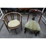 A Victorian mahogany rocking chair an Edward VII mahogany tub chair