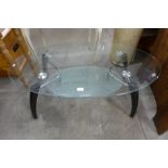 A chrome and glass coffee table