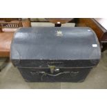 A fitted dome top steamer trunk