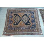 A Persian blue ground rug, 153cm x 170cm