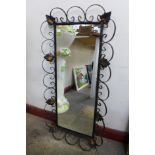 A cast metal framed mirror