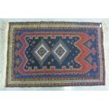 A Persian Afshar blue ground rug, 93cm x 153cm