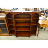 A mahogany breakfront open bookcase