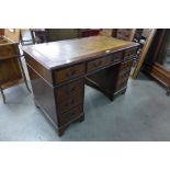 A mahogany pedestal desk