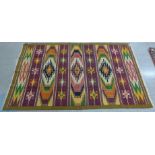 A Turkish Sivas multi-coloured Kilim rug, 143cm x 236cm