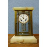 A 19th Century French onyx and glass four sided clock