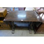 An oak drop-leaf pub table