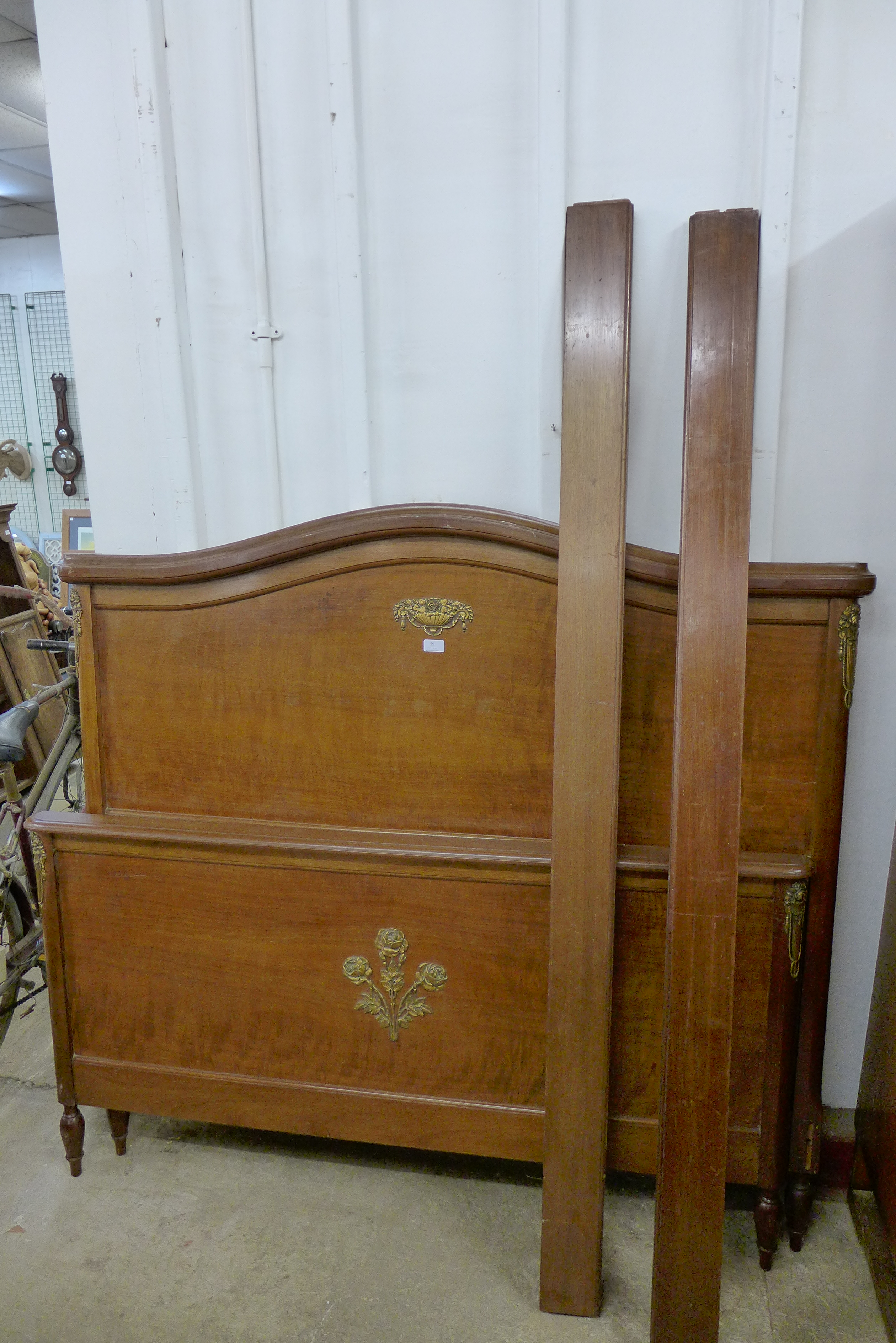 A 19th Century French Empire style mahogany double bed