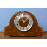 An Art Deco inlaid walnut mantel clock