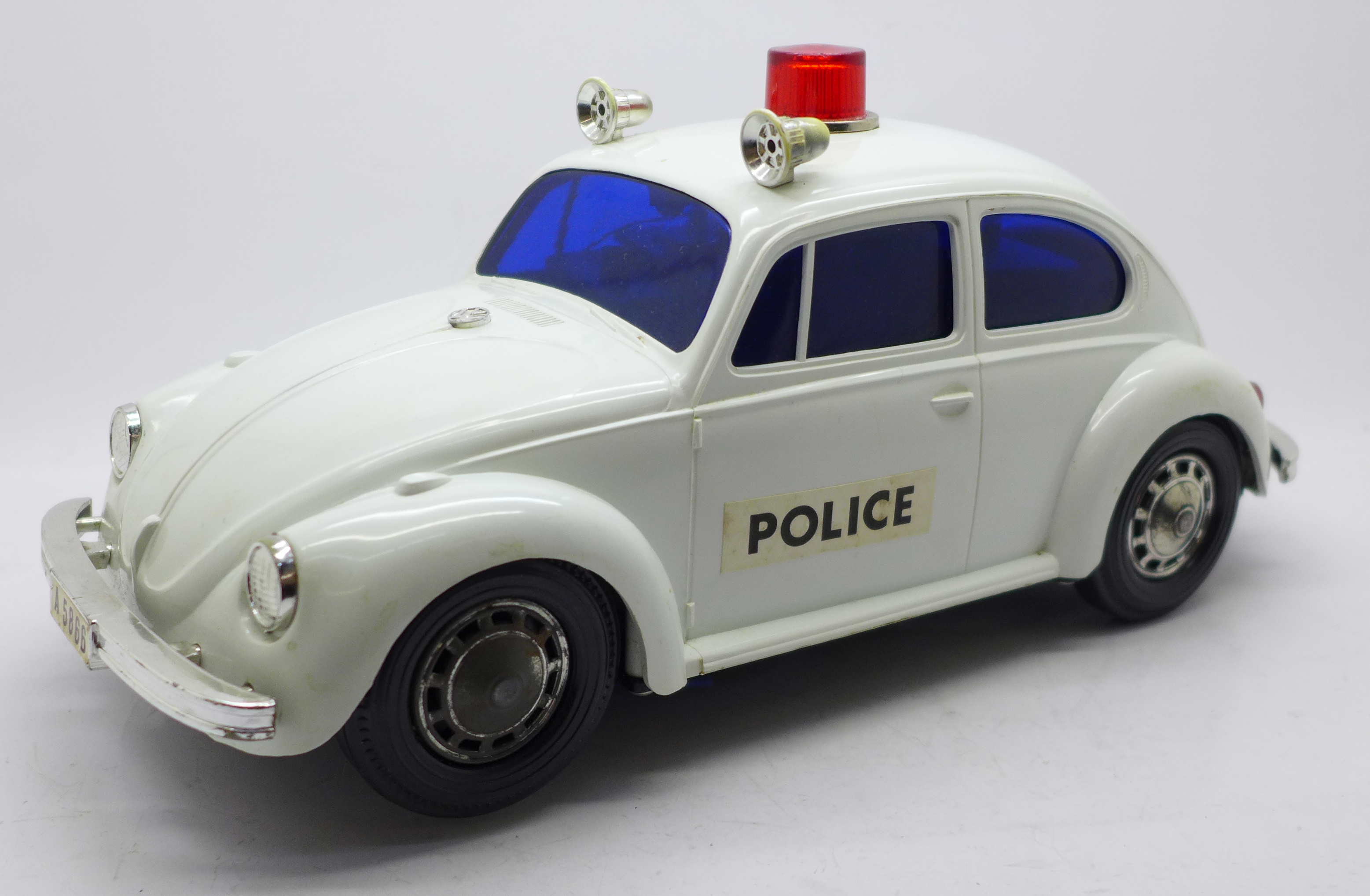 An Alps battery operated Volkswagen Police car, boxed,