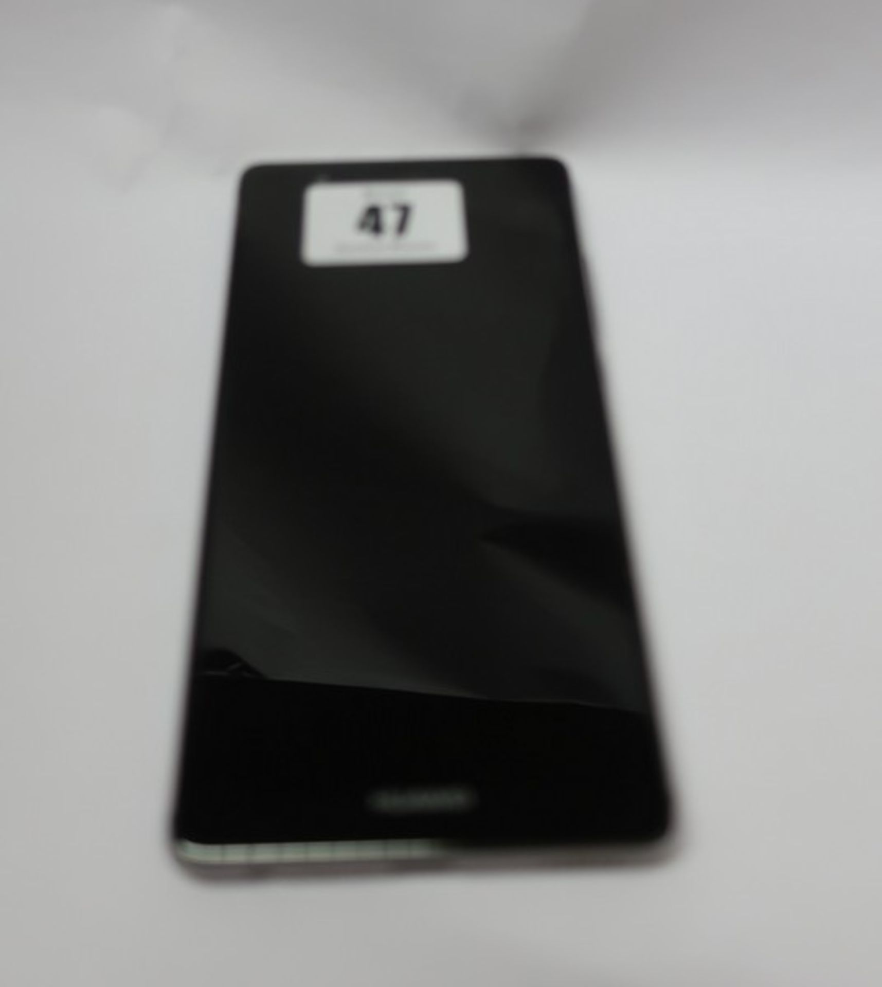 A Huawei P9 EVA-L09 32GB in Titanium Grey (IMEI: 862836034680862) (FRP clear).