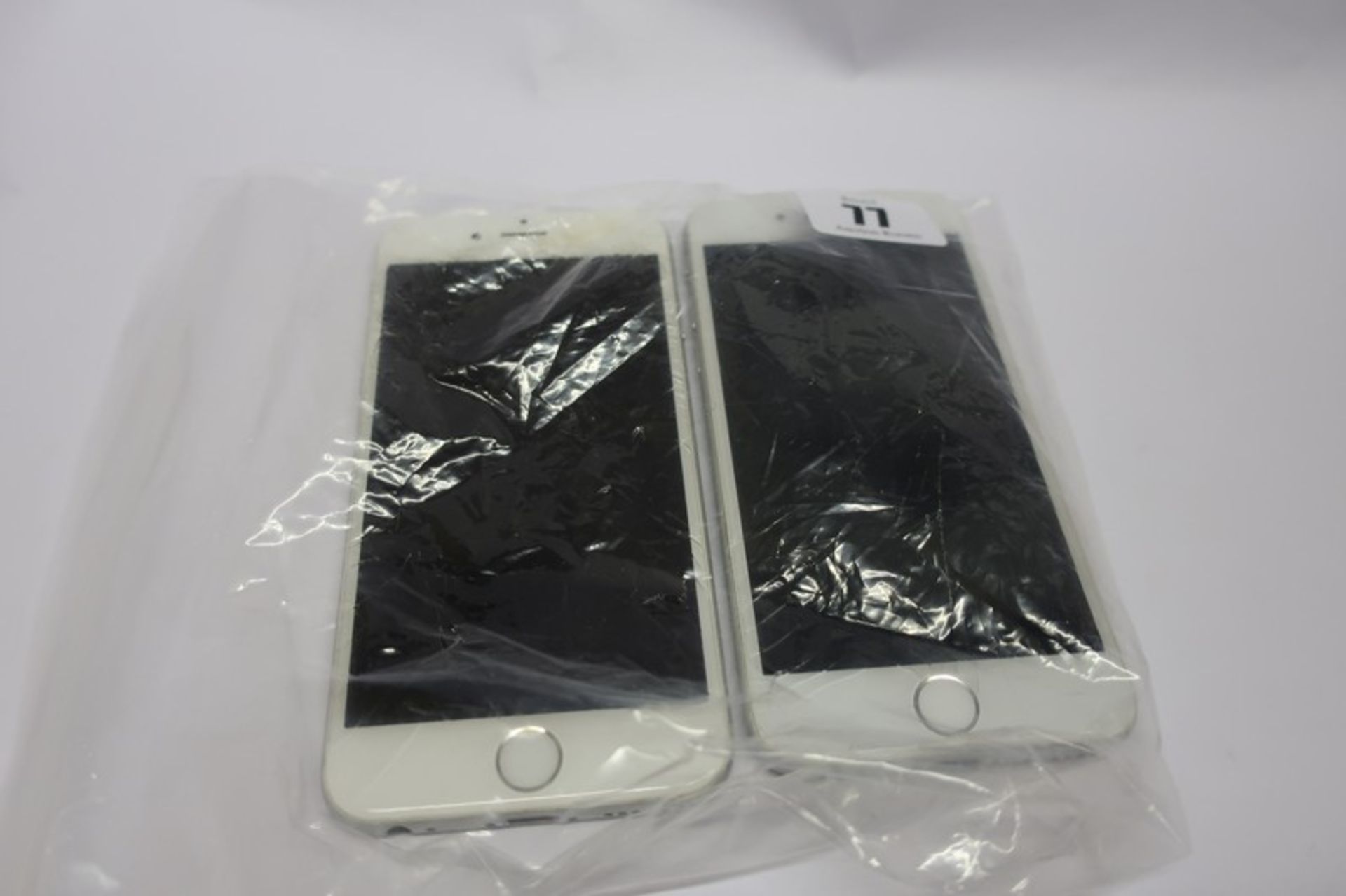 Two Apple iPhone 6 model A1586 (IMEI numbers: 359313066460548/ 3553930711290919) (Damaged screen