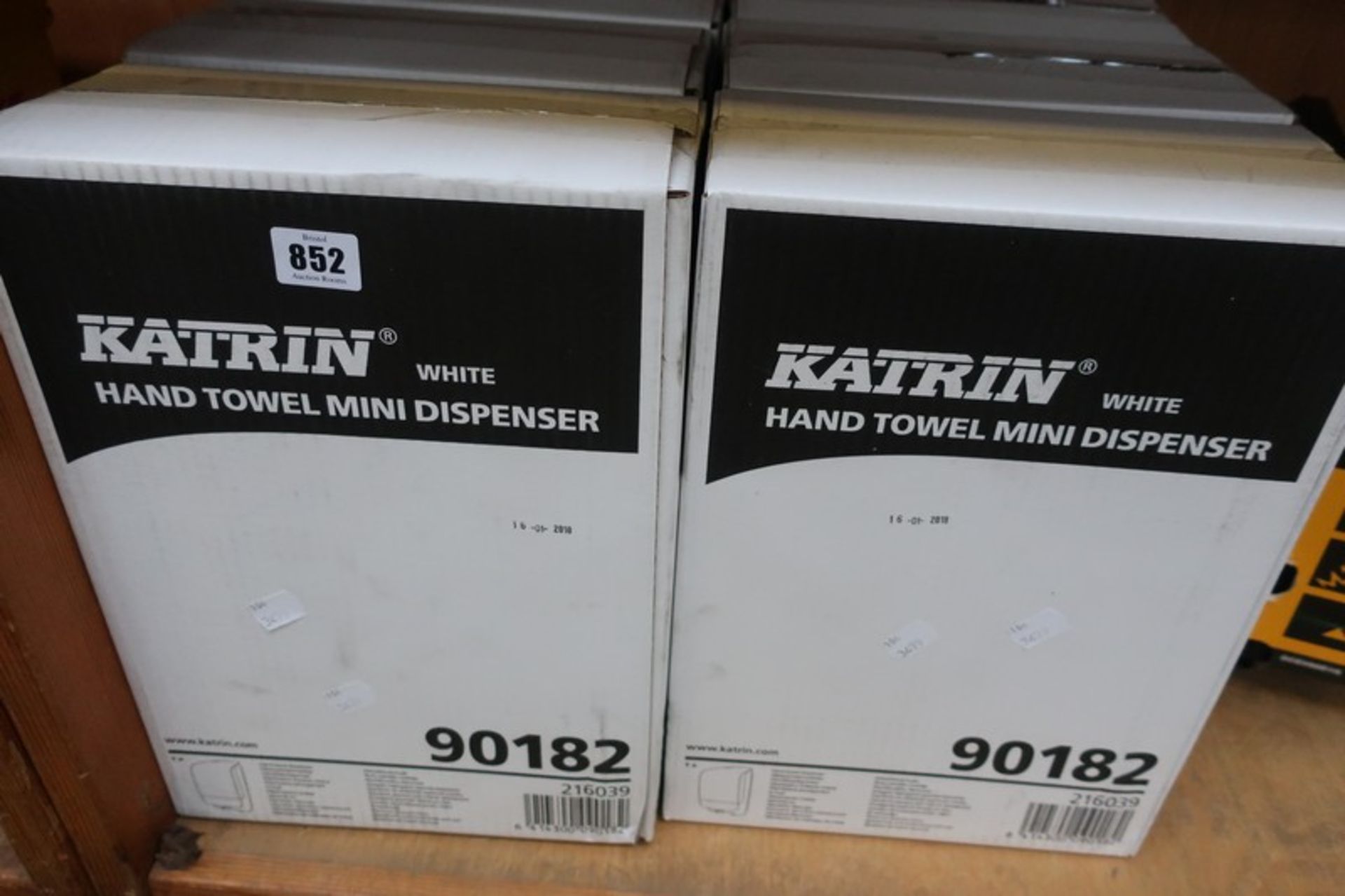 Six Katrin hand towel mini dispenser.