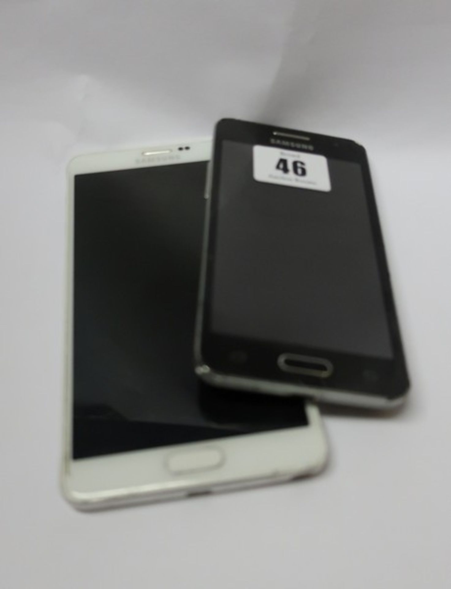 A Samsung Galaxy Note 4 SM-N910S 32GB (IMEI: 354678065651189) and a Samsung Galaxy Core 2 SM-