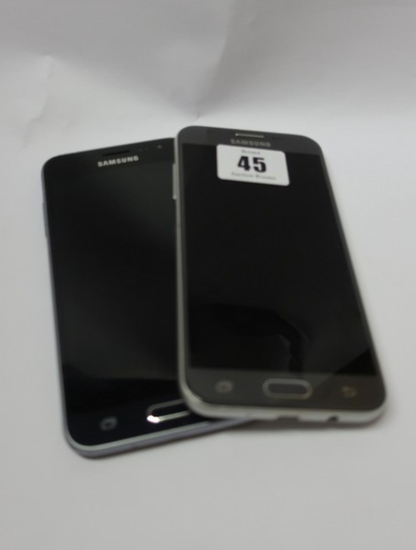 A Samsung Galaxy J3 Emerge SM-J327P 16GB (IMEI: 359102086042232) and a Samsung Galaxy J3 2016 SM-