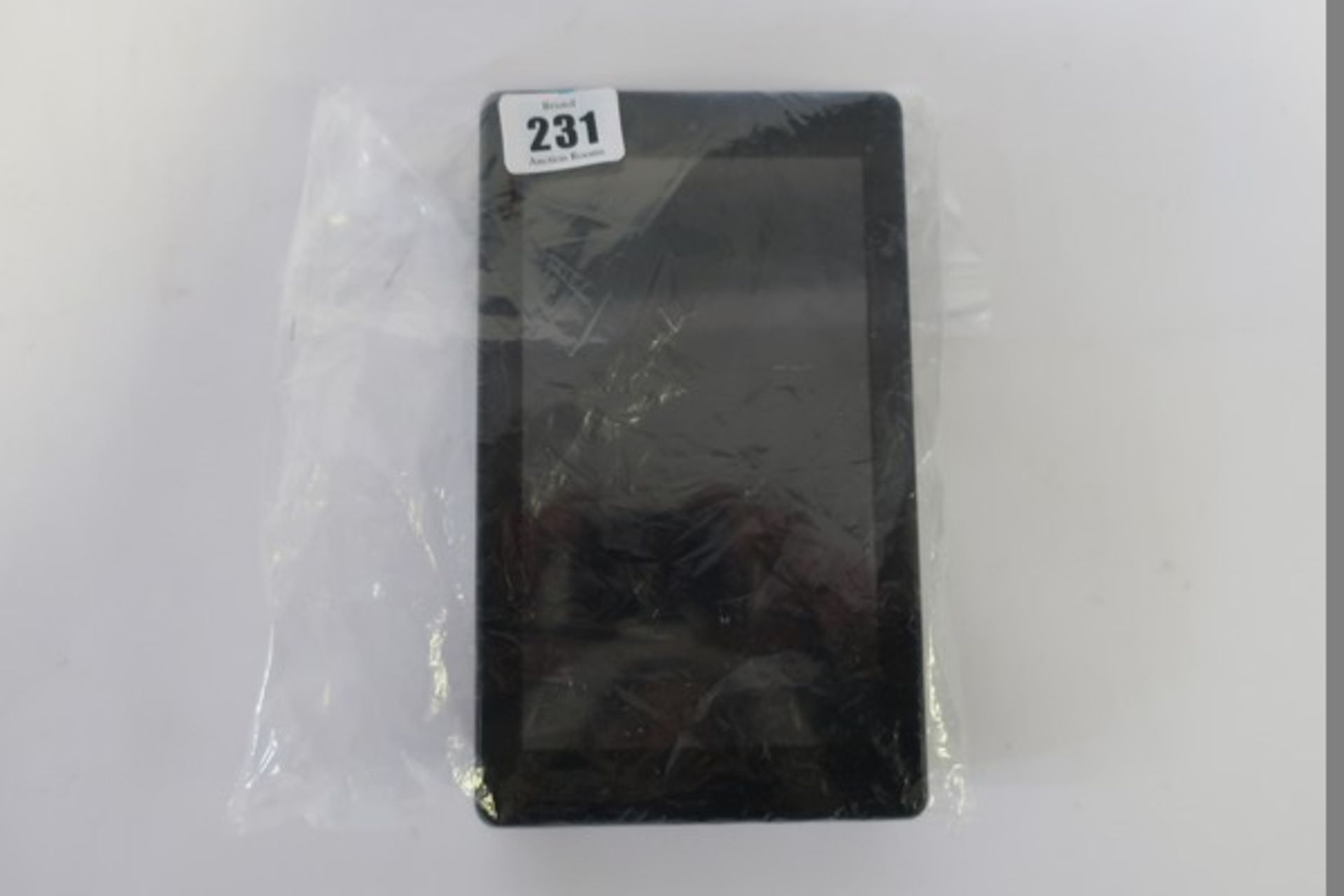 Three Amazon Kindle Fire 7 SR043KL 7" tablets in Black.