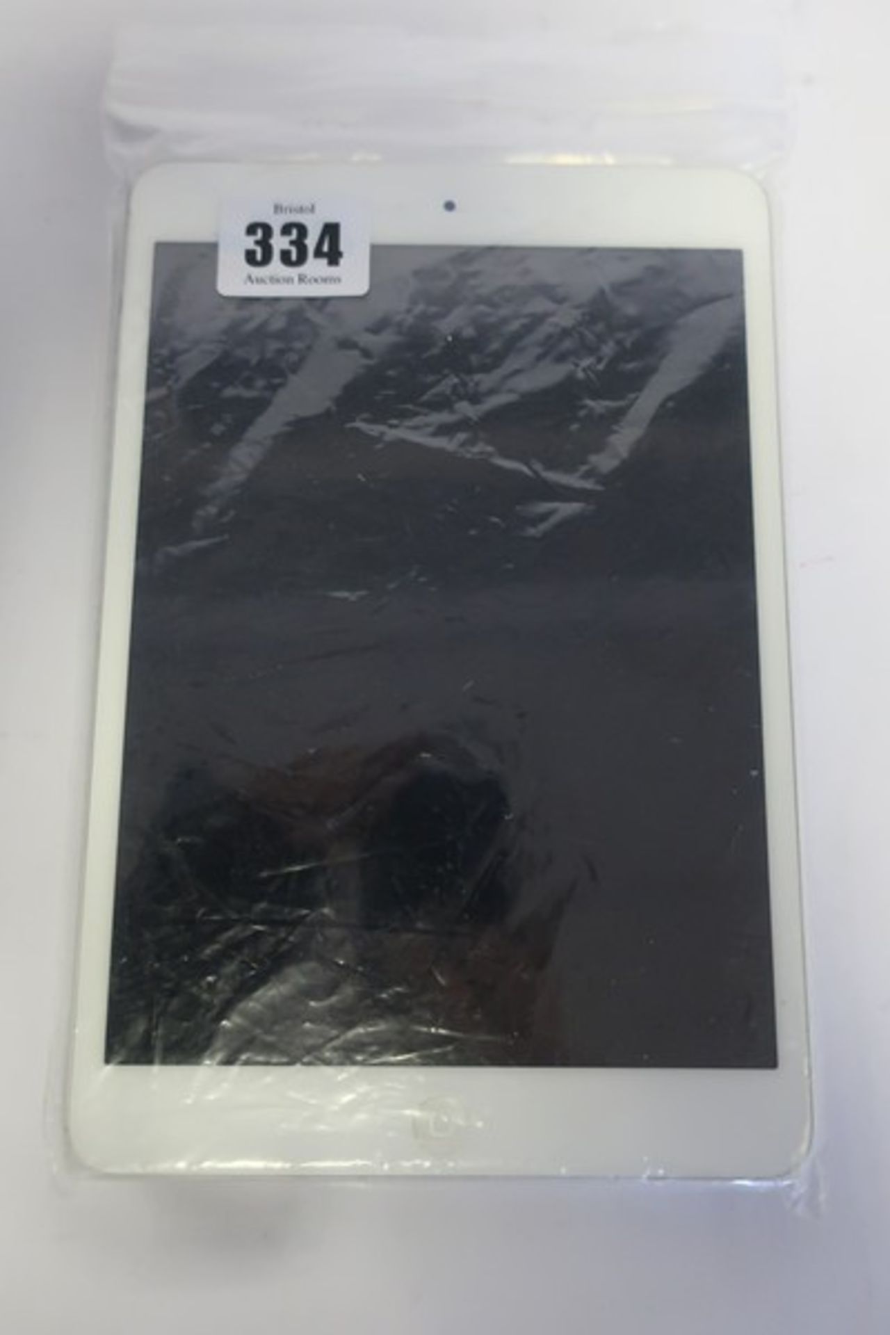 An Apple iPad mini A1455 (Wi-Fi/VZ & Sprint/GPS - 1st Gen) 64GB (Serial: F4KL3072F19P) and an