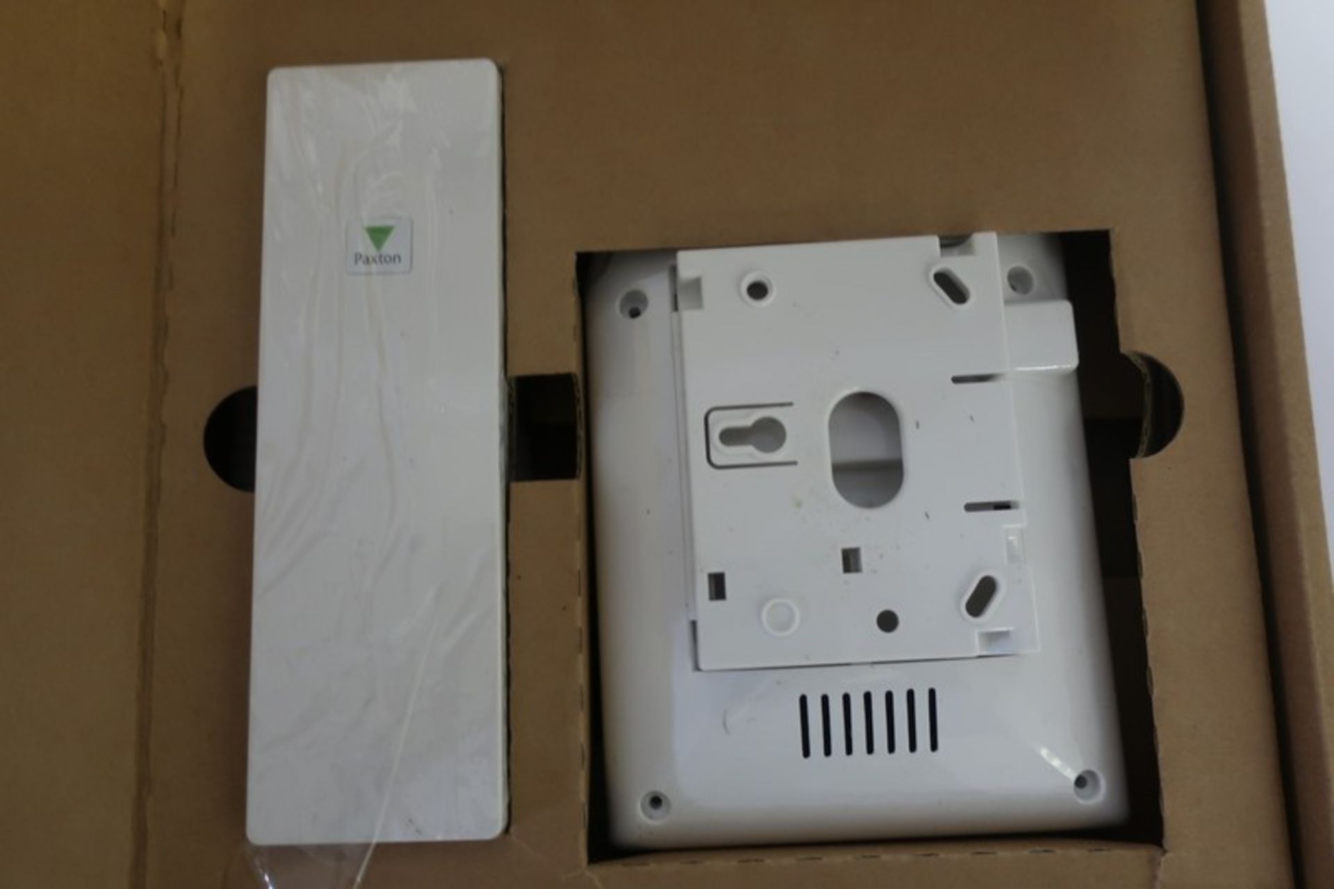 Four Paxton Net 2 intercom wall mount phone units.