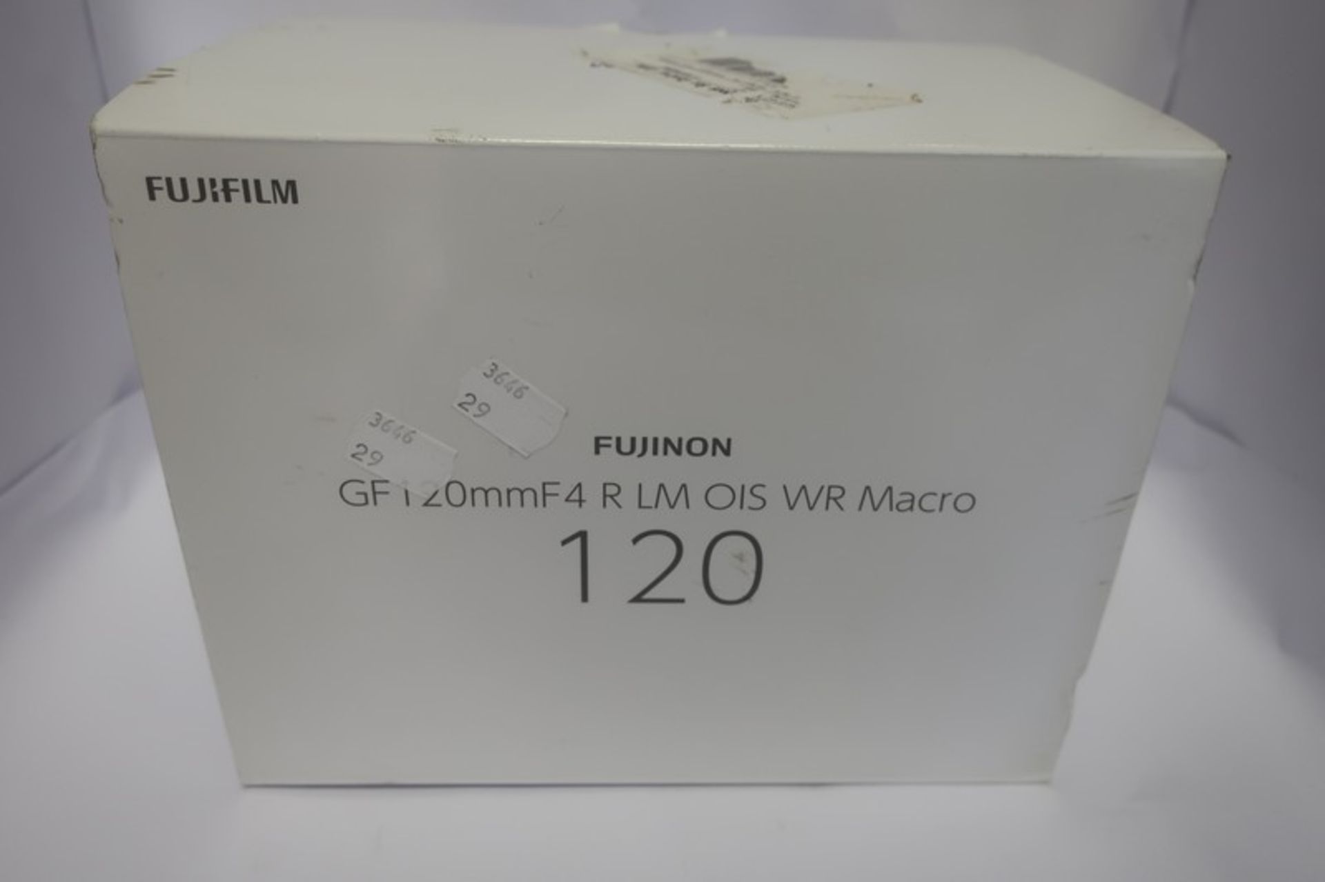 A boxed as new Fujifilm GF 120mm f4 R LM OIS WR Macro lens.