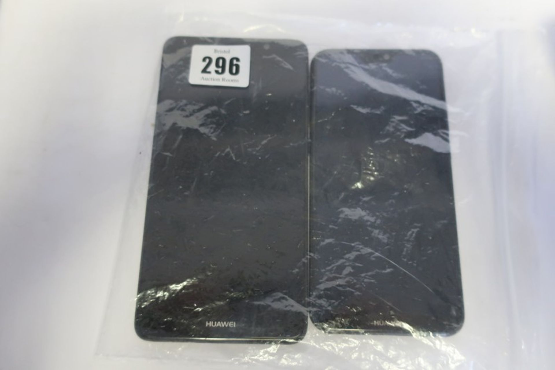 A Huawei P20 Lite ANE-LX1 in Black (Damaged screen glass) and a Huawei Mate 9 MHA-AL00 in Black (