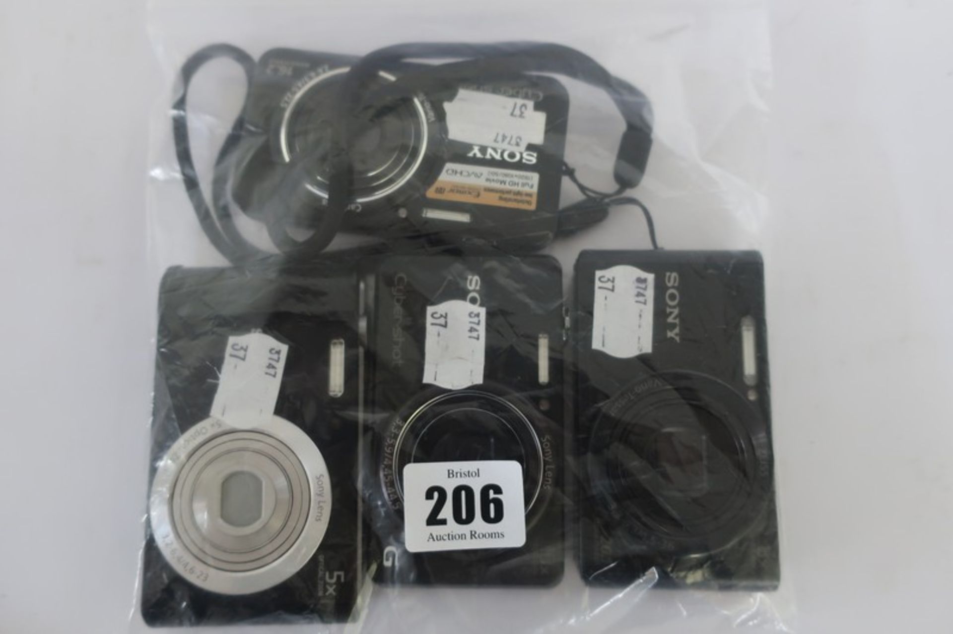Four Sony compact digital cameras; CyberShot DSCW830, CyberShot DSC-WX200, CyberShot DSC-WX7 and a