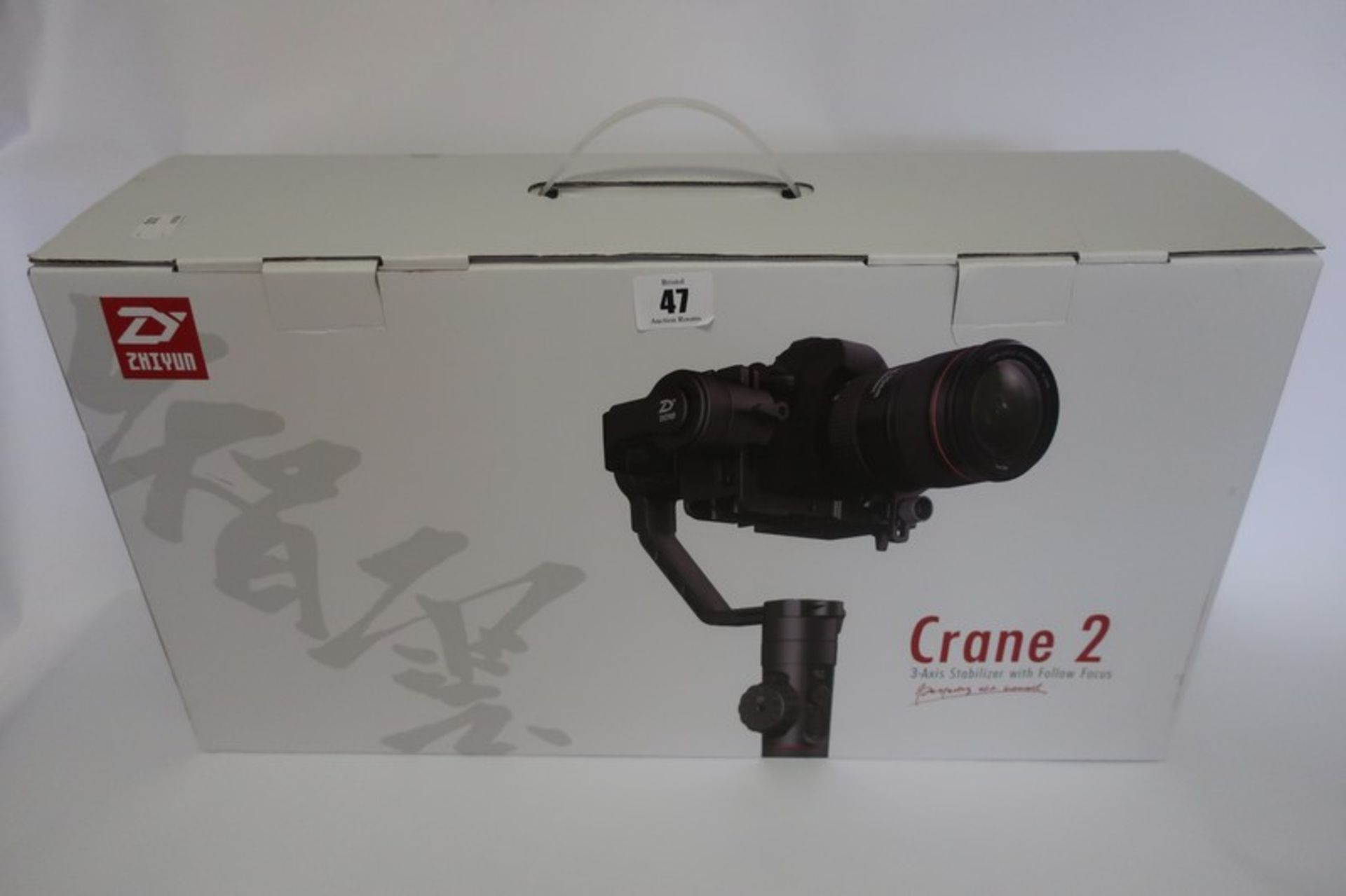 A boxed as new Zhiyun Crane 2 3-Axis handheld stabilizer Gimbal with follow focus control.