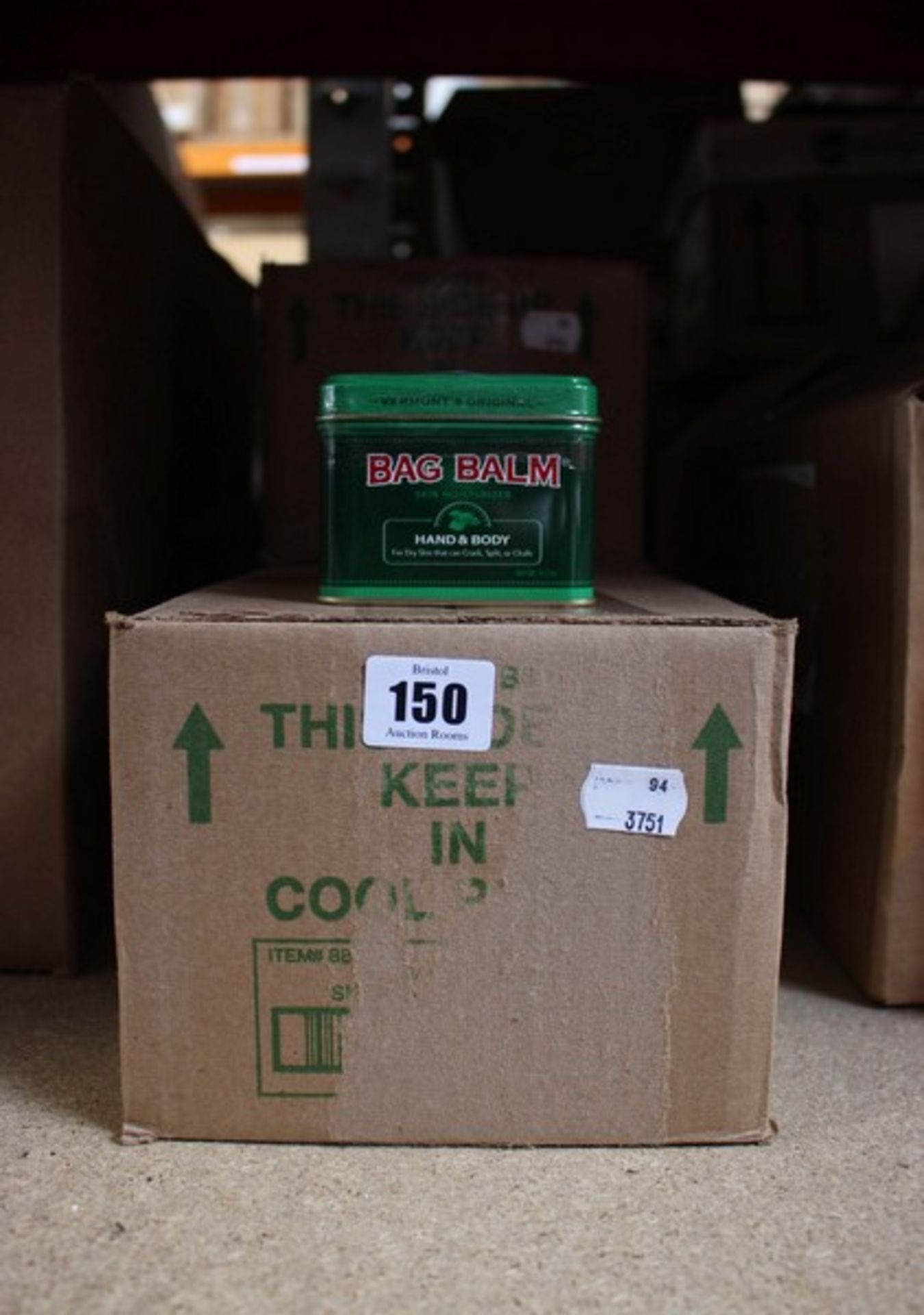 Three boxes of Vermont's Original bag balm skin moisturizer (12 per box- 8oz).