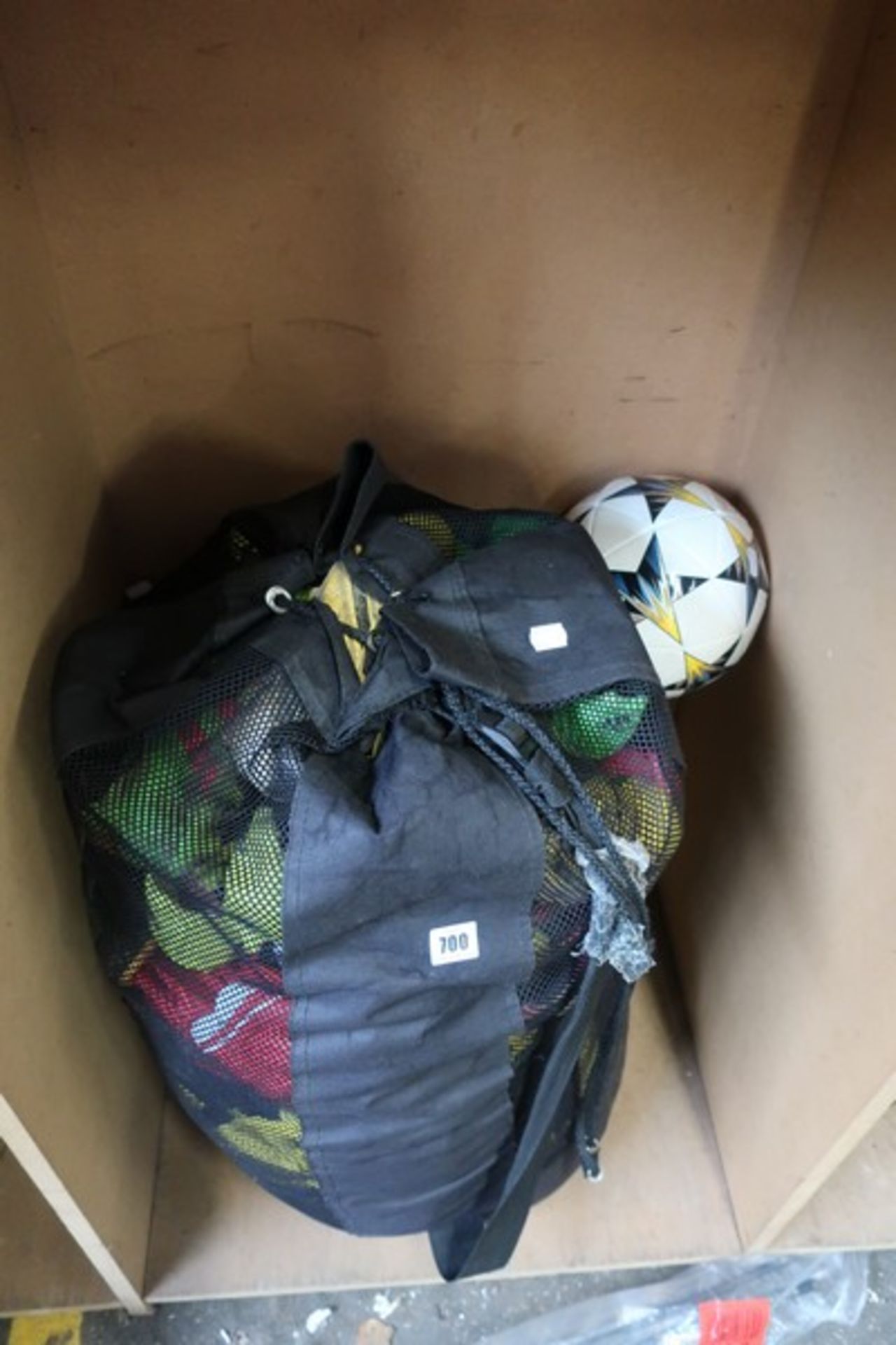 A quantity of football related items to include pre-owned kit and boots, a new Adidas football and