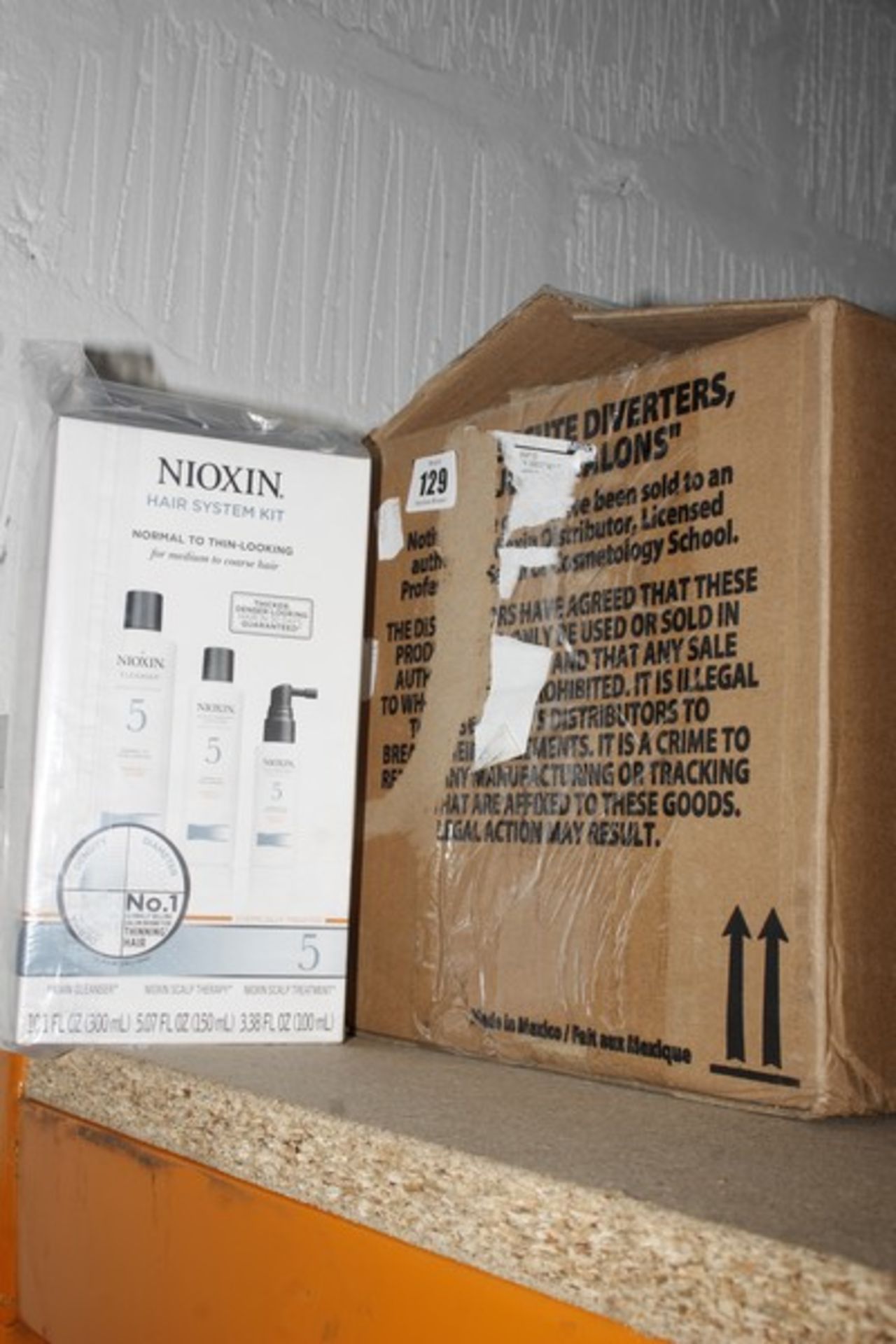 Twelve boxed Nioxin Hair System 5 kits Normal to Thin-Looking for medium to course hair (Nioxin