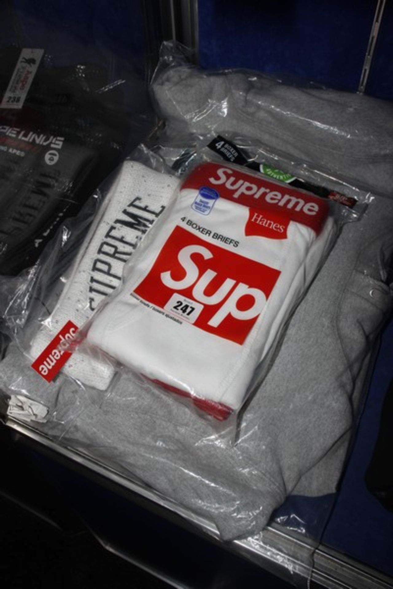 An as new Supreme Marvin Gaye hooded sweatshirt (M), Supreme sweatband and pack of Hanes Supreme