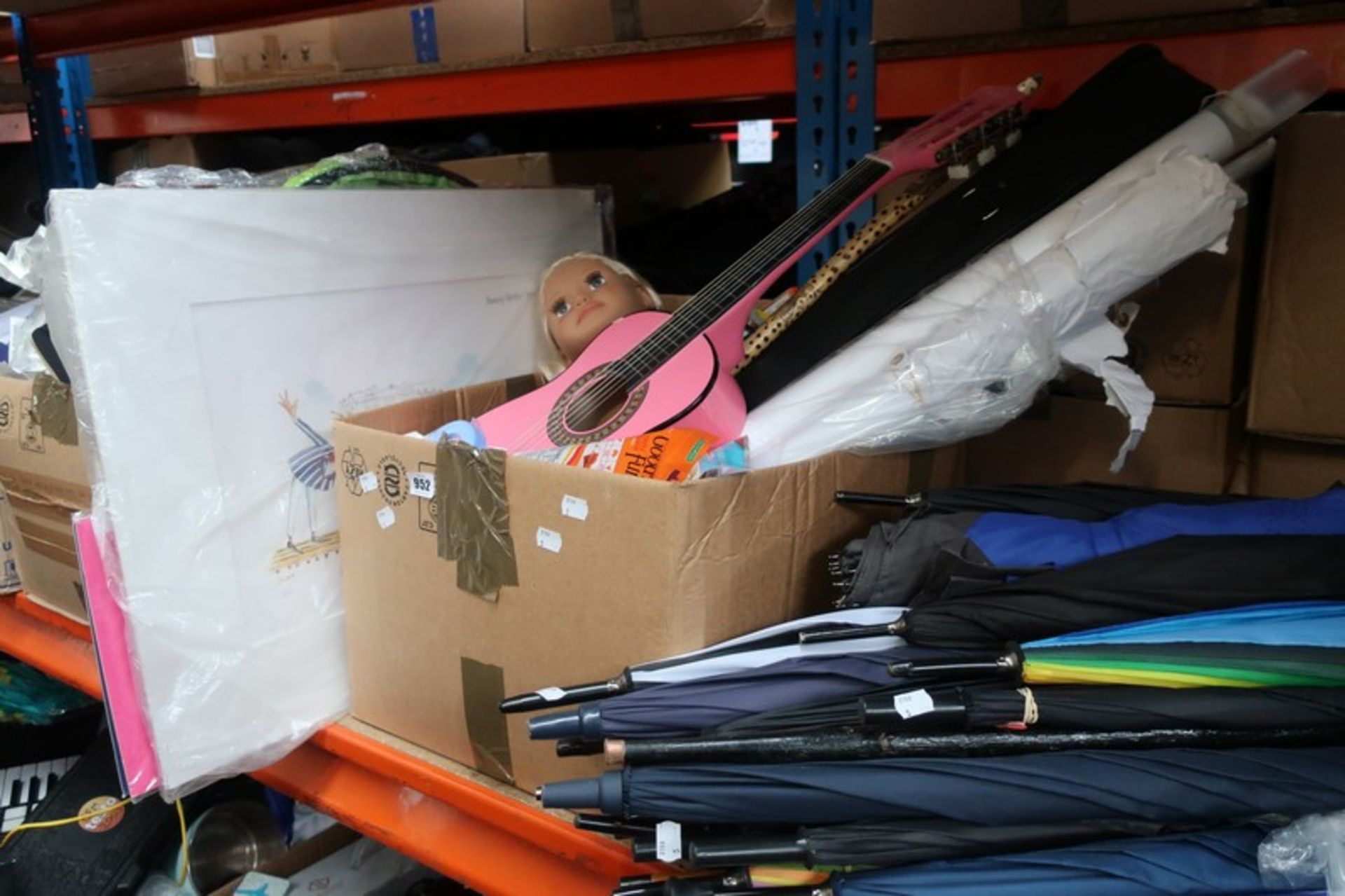 Two boxes of books, two boxes of miscellaneous items and a quantity of umbrellas.