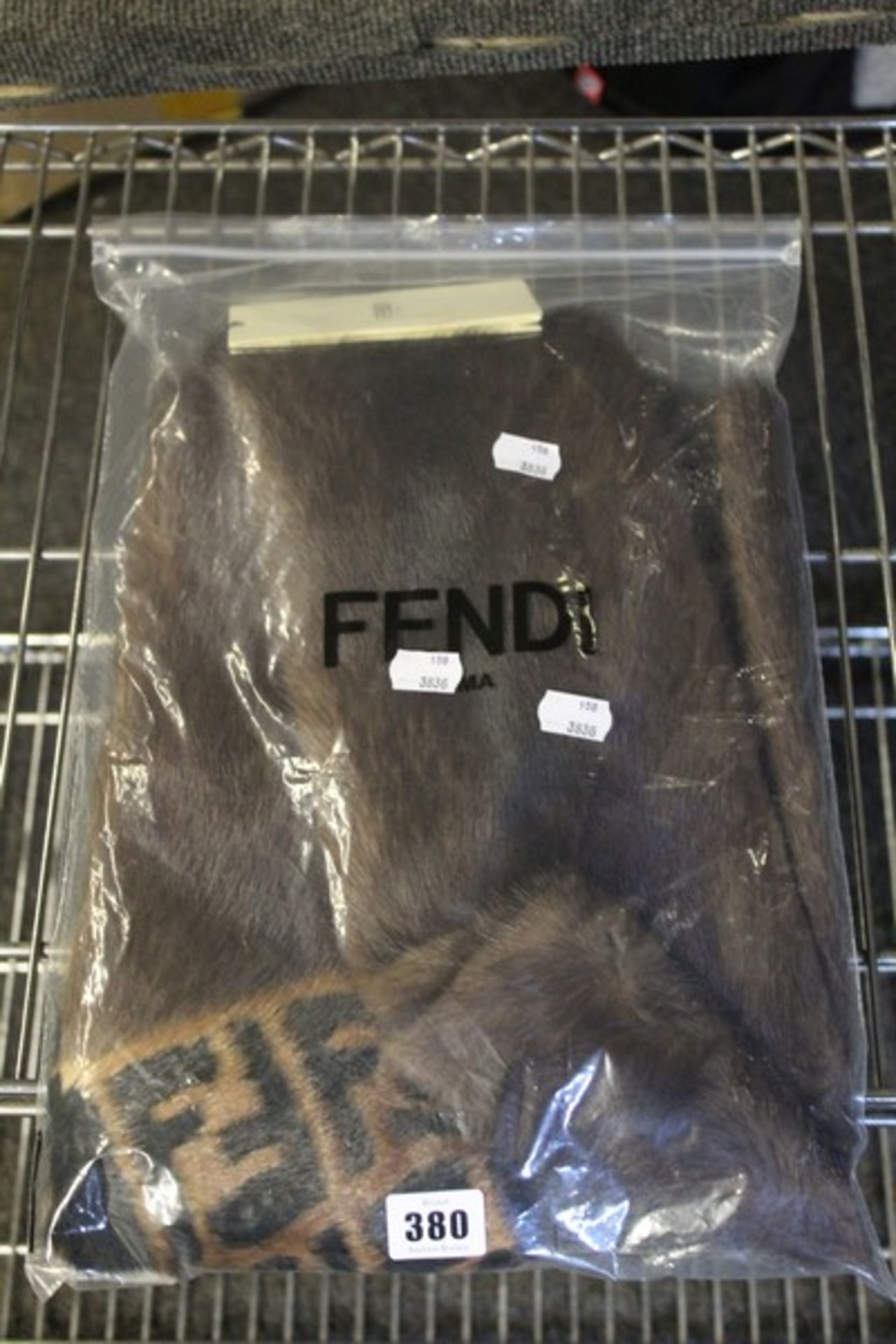 An as new Fendi FMG037 mink scarf in scan brown.