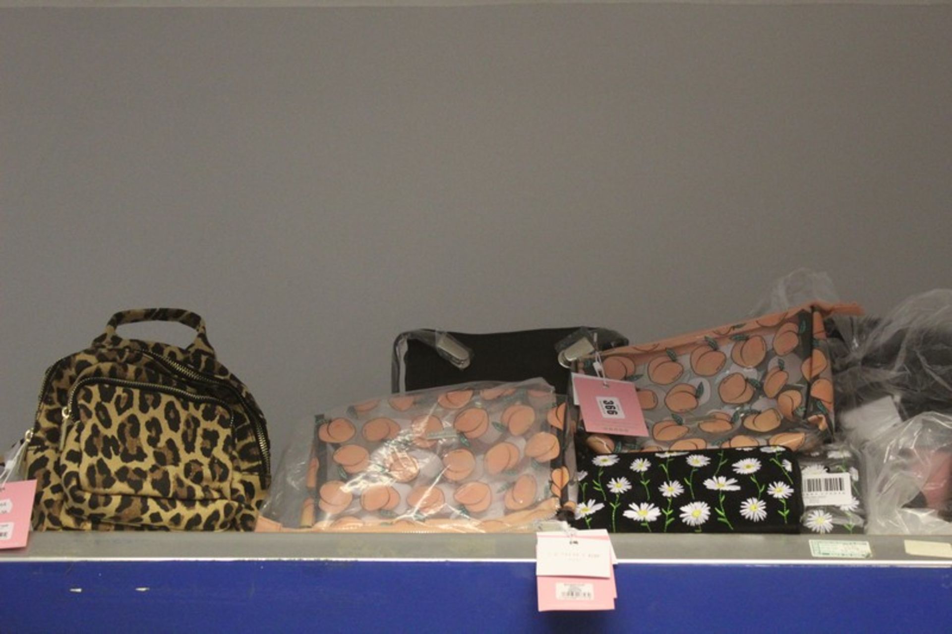 Two as new Skinny Dip Lara backpacks, a Leopard Zadie backpack, three Daisy purses and three