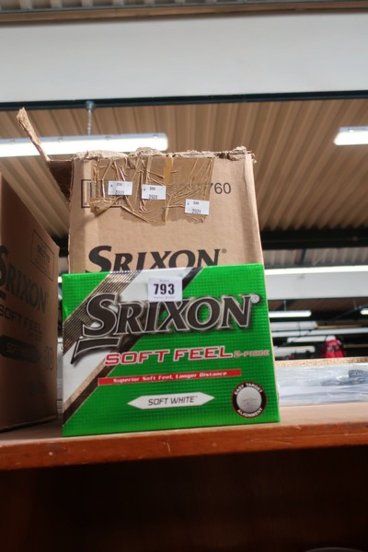 Thirteen packs of Sripxon Soft Feel soft white golf balls (12 balls per pack).
