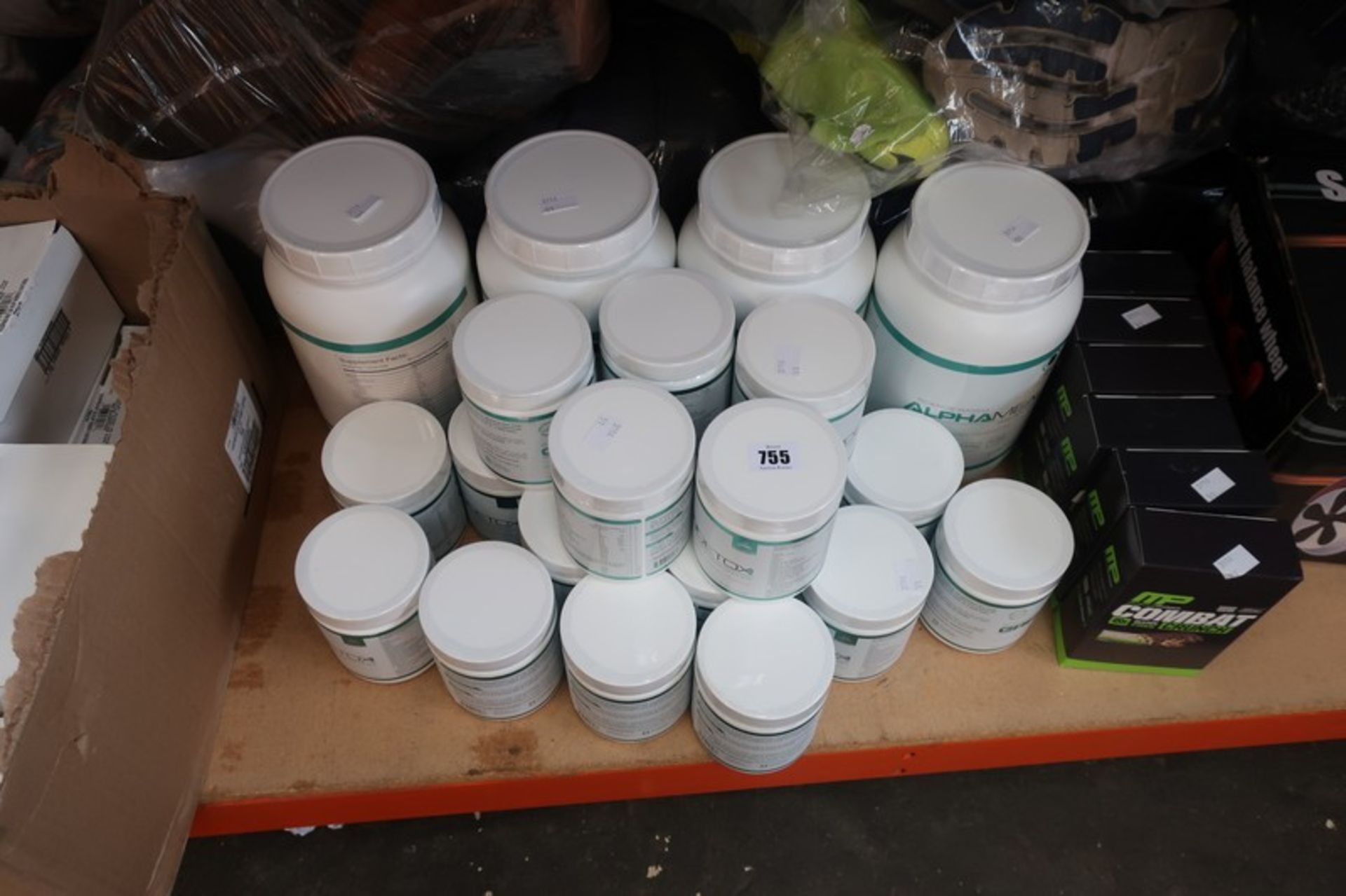 A quantity of health and fitness supplements to include Science Based Green Detox and Alpha Meal.