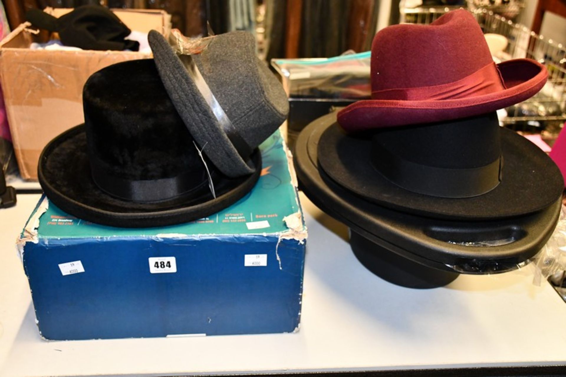 Four assorted hats to include a Borsalino Trionfo (UK 7 3/8) in hard protective hat case and a