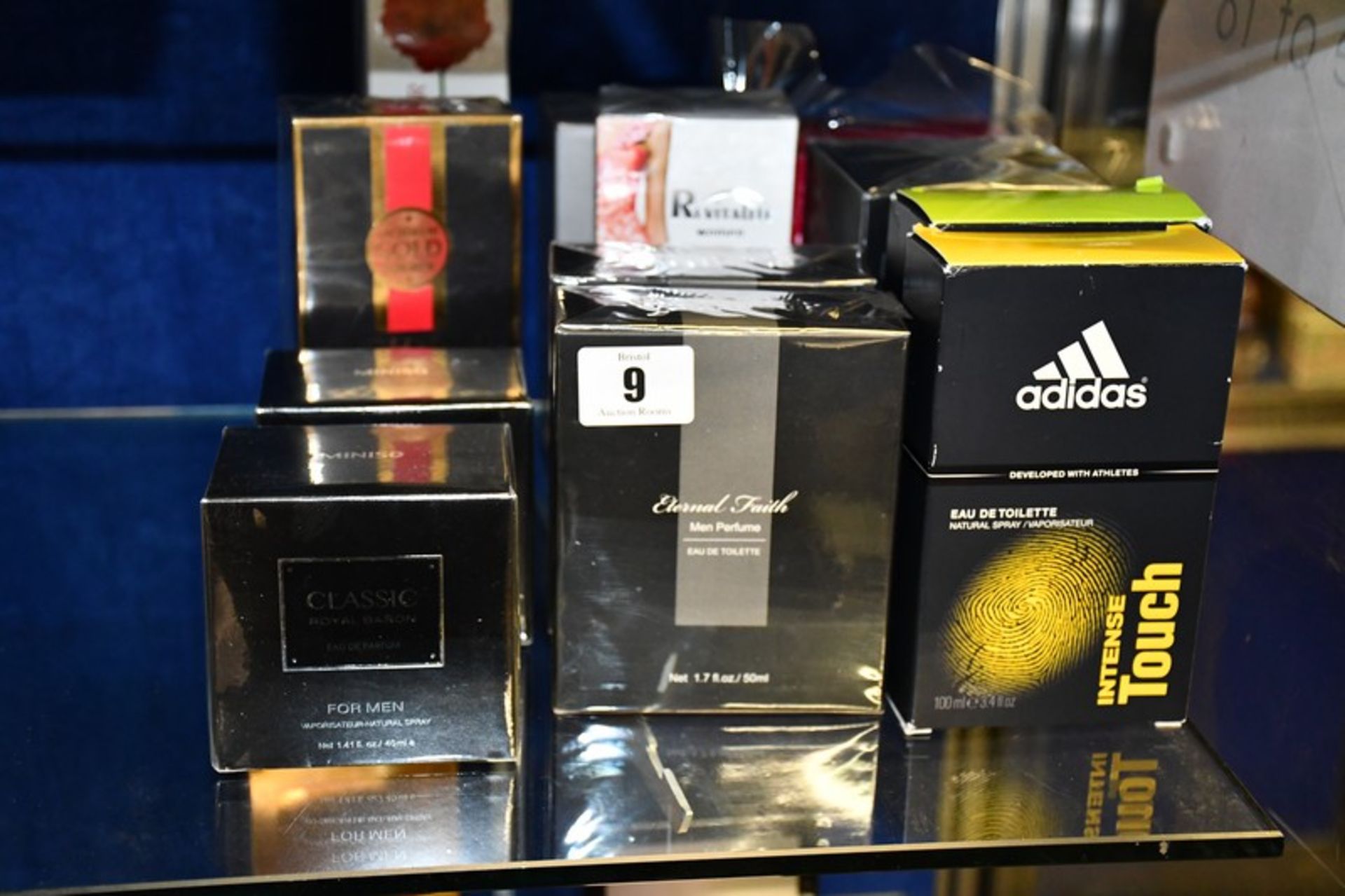 Twelve assorted parfums to include Britney Spears, Halloween man, Adidas, Laghmani gold,