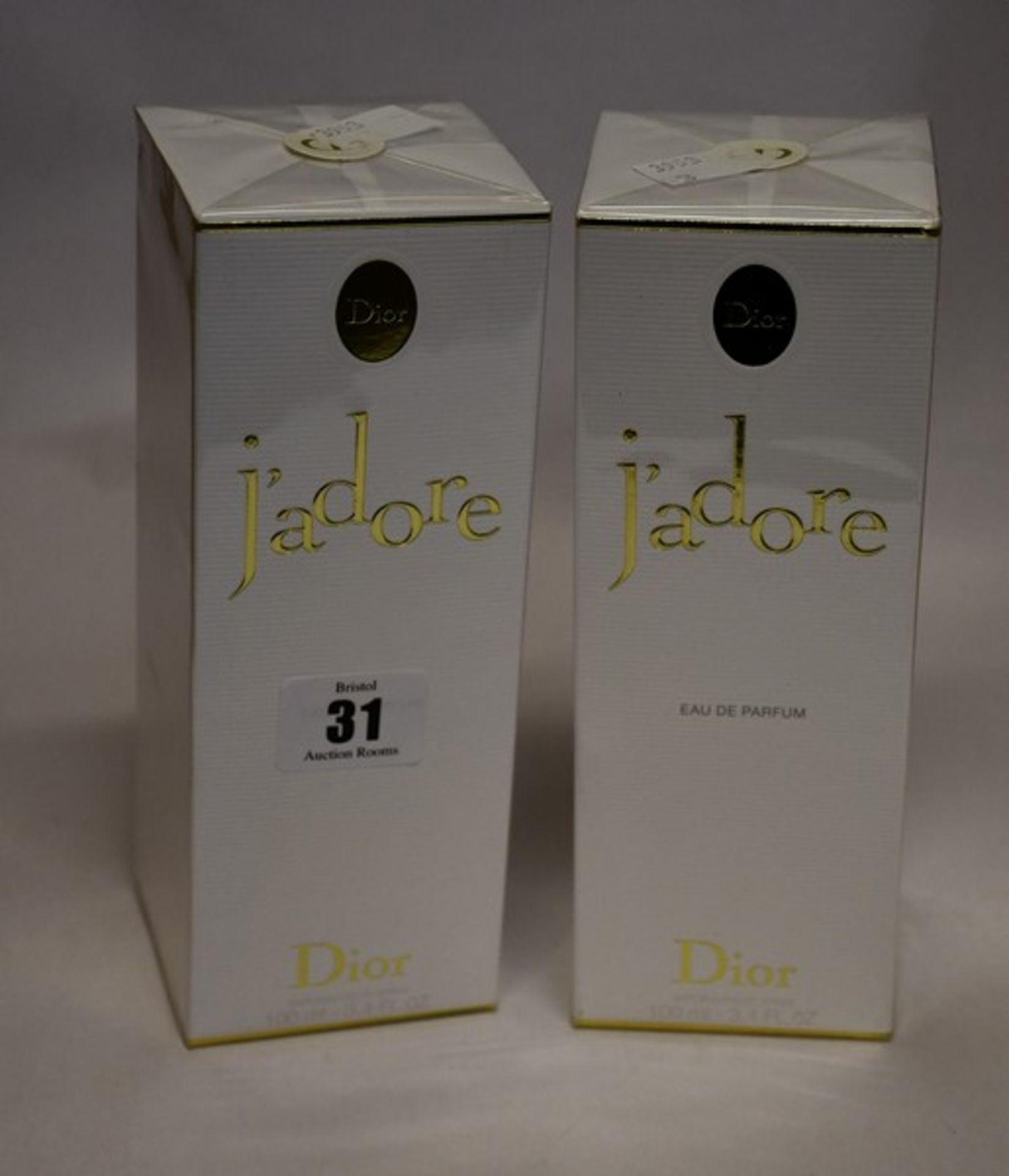 Two boxed as new Dior J'adore eau de parfum (100ml).