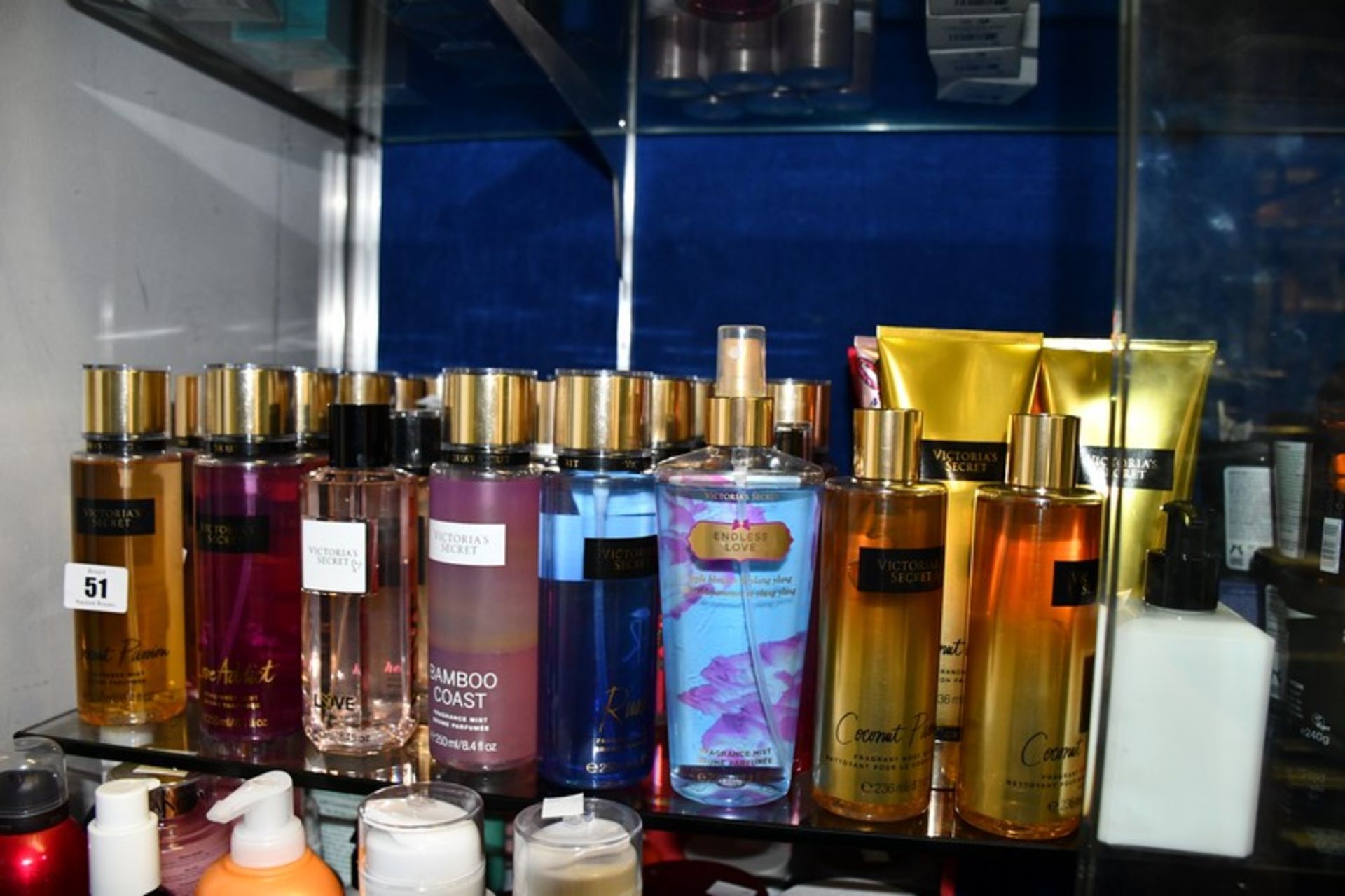 Thirty three Victoria's Secret fragrance mists, twelve fragrance body lotions and two body washes.