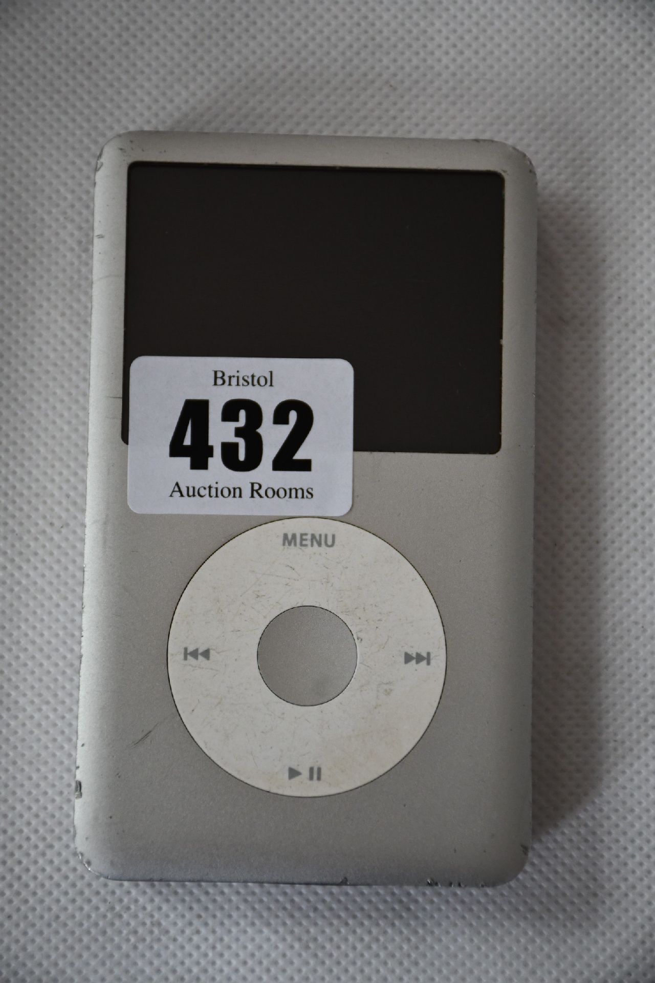 A pre-owned Apple iPod Classic 7th Gen (A1238/MC293) 160GB in Silver (Some cosmetic damage).