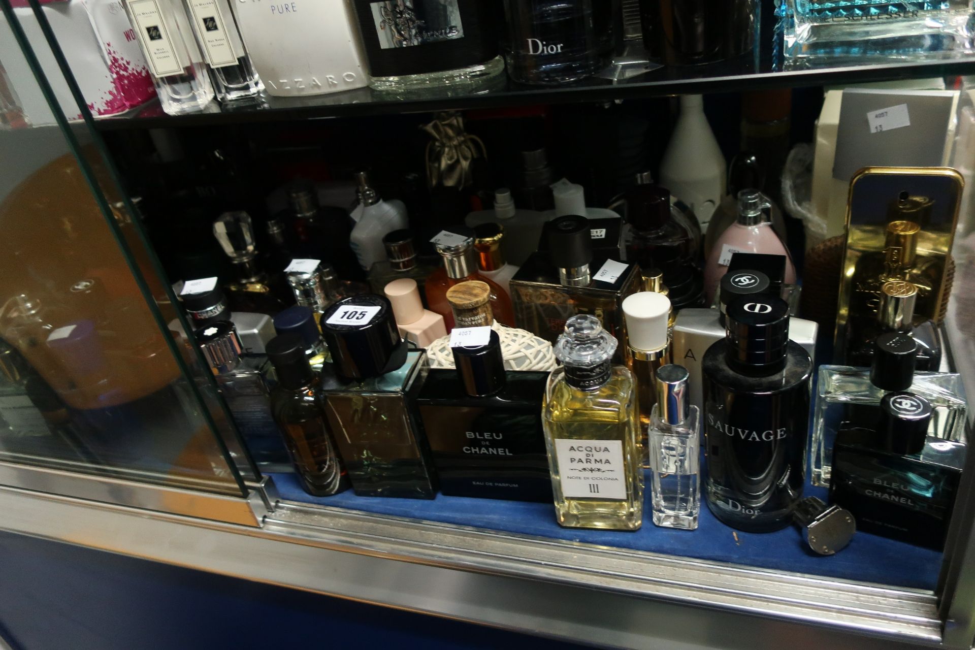 A quantity of part used parfum/eau de toilettes to include Chanel, Creed, Hugo Boss and Aqua Di