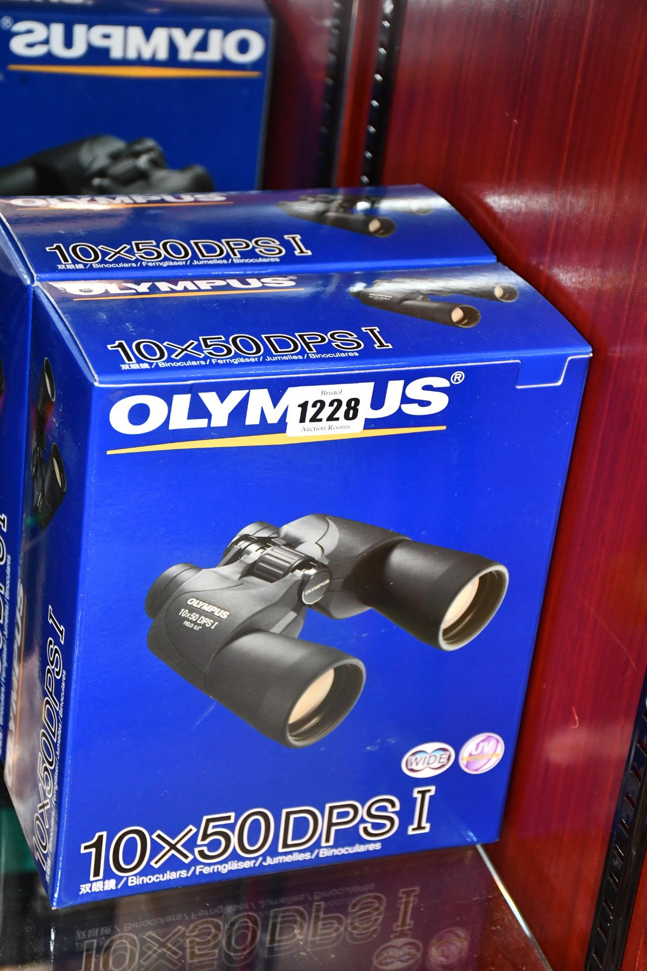 Two boxed as new Olympus 10 x 50 DPS I binoculars.