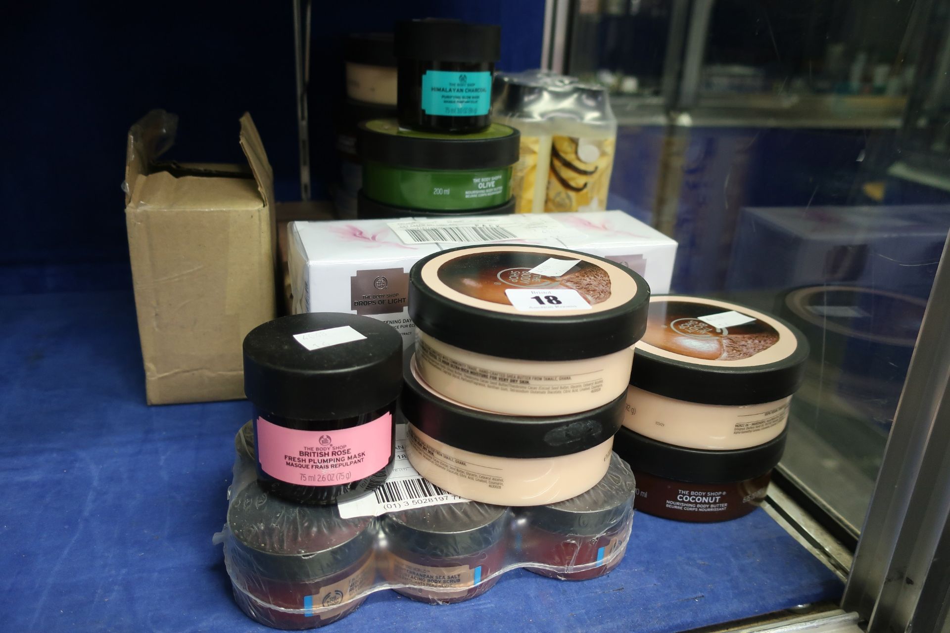 A quantity of as new Body Shop products to include six Drops Of Light pure healthy brightening day