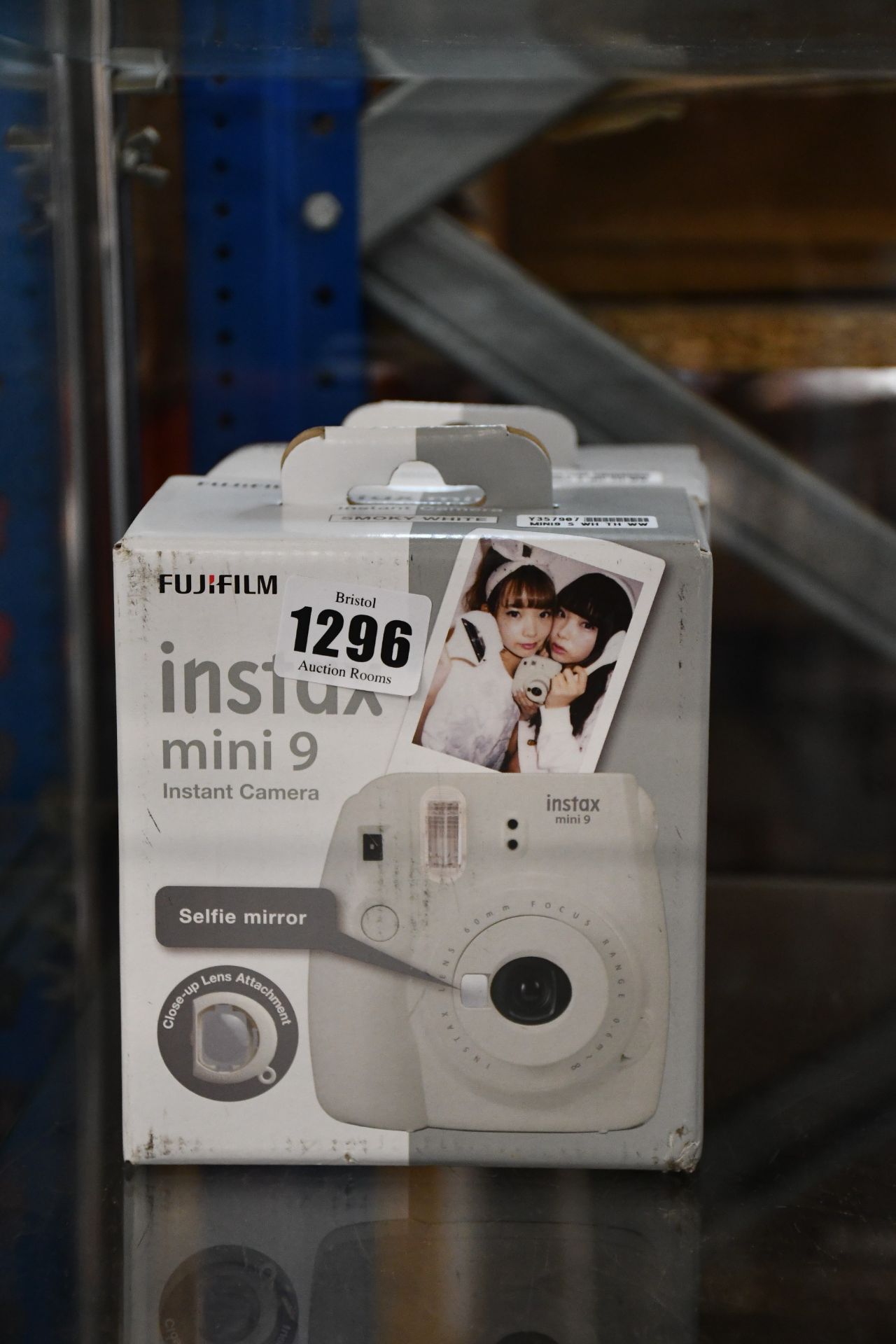 Two boxed as new Fujifilm instax mini 9 instant cameras in smoky white.
