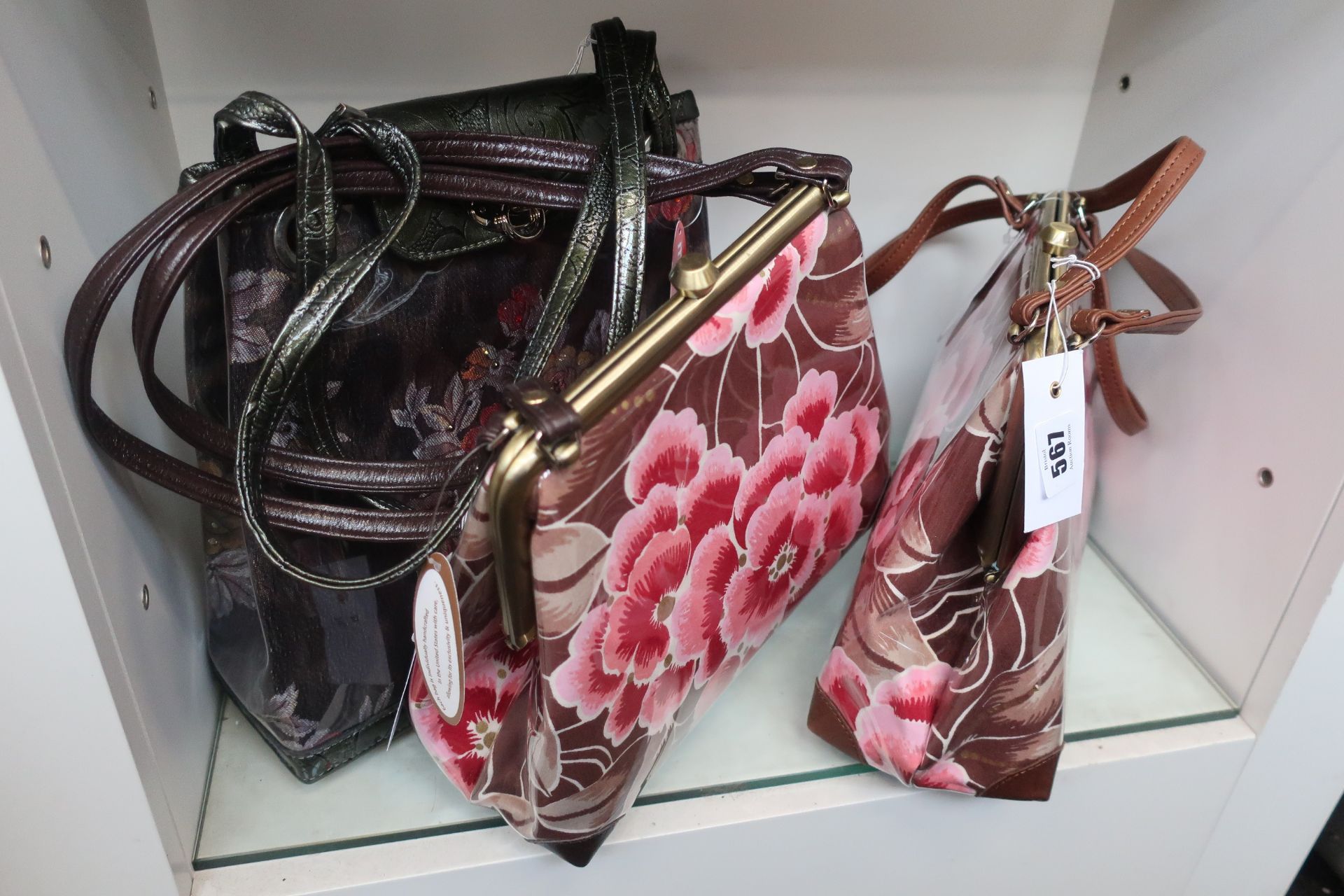 Two as new M.andonia handbags with oriental flower design and one M.andonia handbag with flower